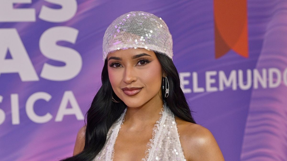 Becky G Stuns in Trendy Peekaboo Look with Bold Bra and Suit Combo